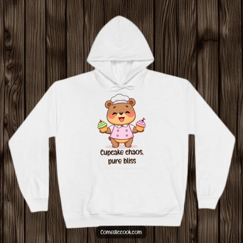Funny Kawaii bear chef hoodie with a character juggling cupcakes, perfect for cozying up.