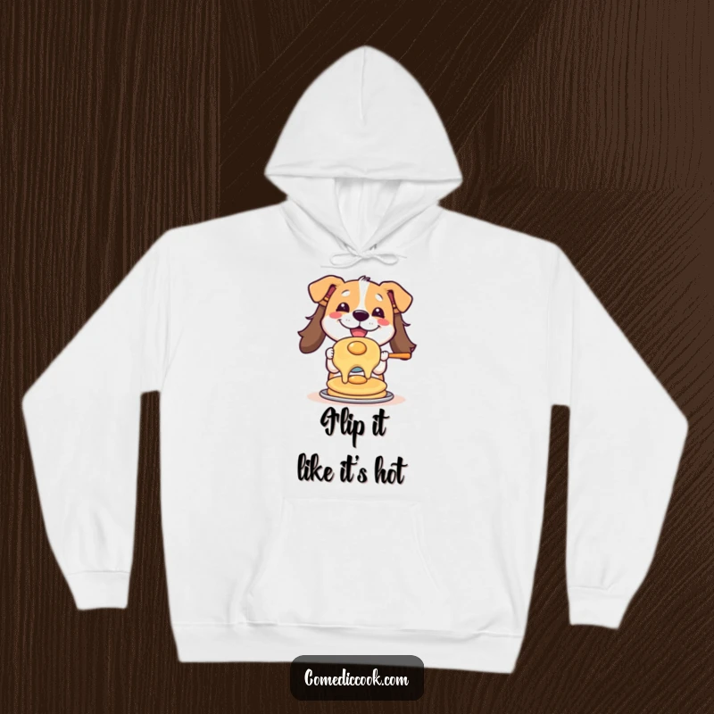 Funny hoodie depicting a happy dog mid-pancake flip, designed for warmth and guaranteed smiles, perfect for cozy, humorous wear.