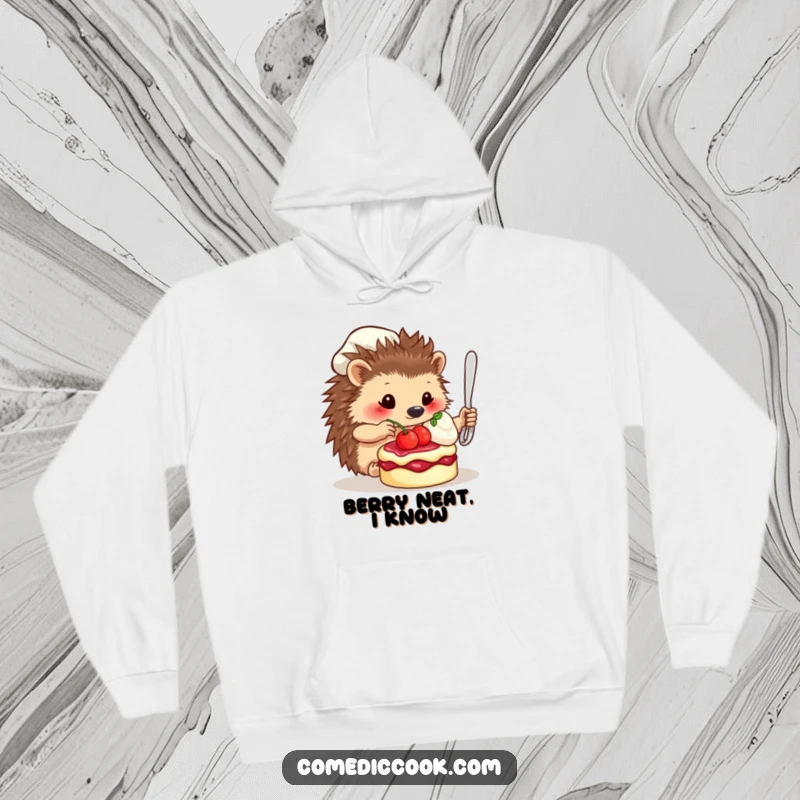 Funny Hoodie: A detailed illustration of a hedgehog chef carefully adding a single berry to a fancy dessert masterpiece.