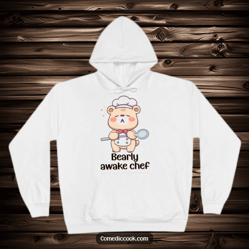 Funny Sleepy Bear Chef Hoodie showing a tired bear mid-yawn holding a giant spoon, perfect for cozy, humorous, and warm gifting.