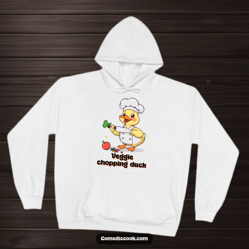 Funny Duck Chef Hoodie: A bouncing duck chef energetically chops vegetables, offering warm and humorous comfort.