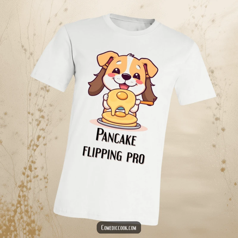 Funny t-shirt featuring a cheerful dog with its tongue slightly out, perfectly flipping a pancake, highlighting a love for cooking and canine comedy.